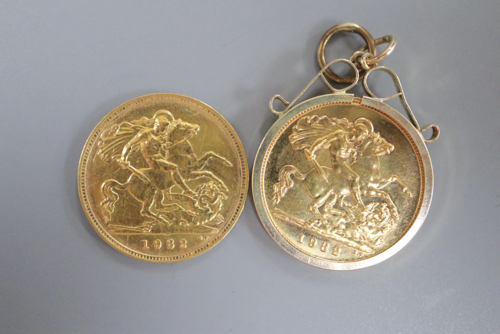 Two 1982 gold half sovereigns, one in 9ct gold mount, gross 8.9 grams.